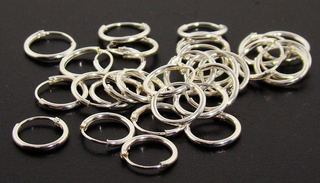12 Pair Mini Hoop Sterling Silver Earrings